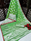Parrot green color banarasi silk saree with jacquard weaving butta