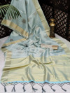 Gray color soft tissue linen silk saree with zari woven butti