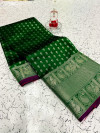 Green color banarasi silk saree with silver zari work