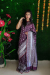 Magenta color lichi silk weaving saree with zari work