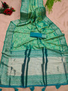 Light green color patola silk saree with zari woven work