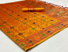 Mustard yellow color patola silk saree with woven work