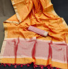 Oragne color tussar silk saree with zari weaving border