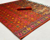Orange color patola silk saree with woven work