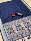 Navy blue color soft paithani silk saree with silver zari weaving work