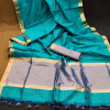 Firoji color tussar silk saree with zari weaving border