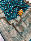 Green color soft banarasi silk saree with gold zari woven work