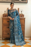 Blue color tussar silk saree with zari woven border
