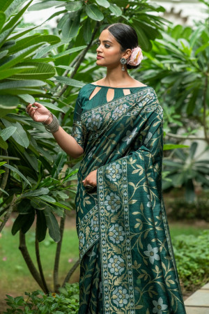 Dark green color tussar silk saree with zari woven border