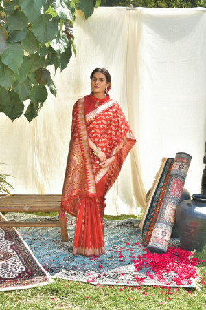 Red color tussar silk saree with zari weaving work