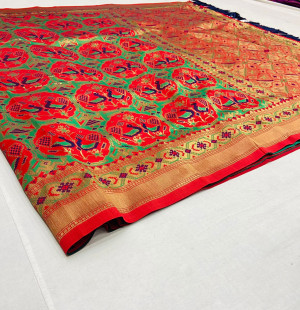 Red color patola woven design silk saree with gold zari weaving work