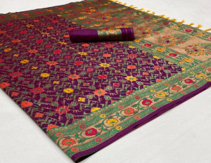 Purple color patola silk saree with woven work