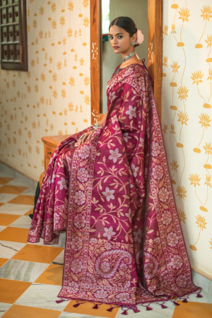 Magenta color tussar silk saree with zari woven border