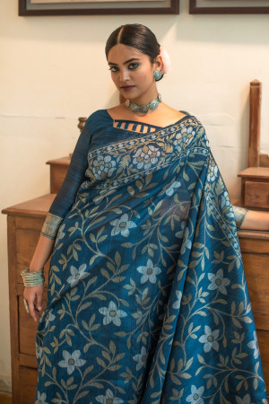 Blue color tussar silk saree with zari woven border