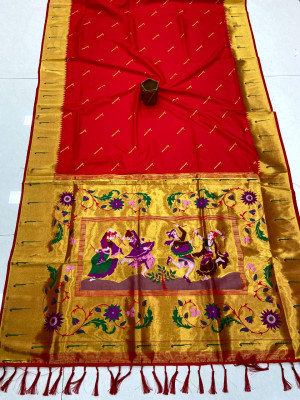 Red color soft banarasi silk saree with zari weaving work.