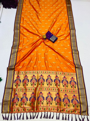 Mustard yellow color soft paithani silk saree with gold zari weaving work