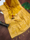 Yellow color soft raw silk saree with woven design