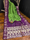 Green and magenta color hand bandhej silk saree with zari weaving work