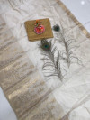 Off white color soft assam silk saree with zari weaving work
