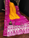 Yellow and pink color hand bandhej silk saree with zari weaving work