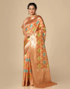 Orange color soft organza silk saree with zari weaving work