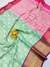 Sea green color kanchipuram silk saree with zari woven work