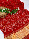 Red color soft hand bandhej gajji silk saree with zari weaving work