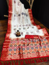 White color dola silk saree with zari weaving work