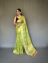Parrot green color linen silk saree with woven design