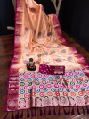 Peach color dola silk saree with zari weaving work