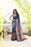 Navy blue color tussar silk saree with printed work