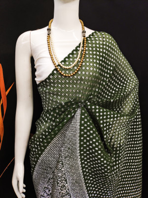 Mahendi green color soft georgette saree with foil printed work