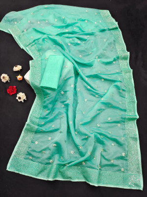 Sea green color soft organza silk saree with sequence work