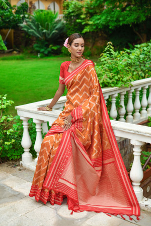 Mustard yellow color soft raw silk saree with woven design
