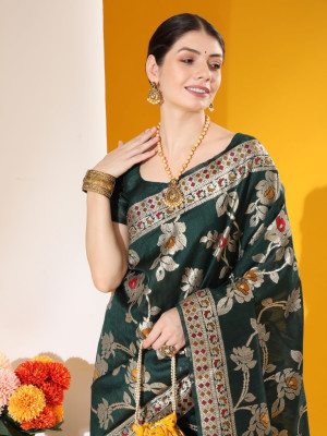 Bottel green color tussar silk saree with zari woven work