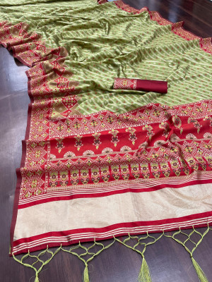 Mahendi green color soft cotton patola saree with woven design