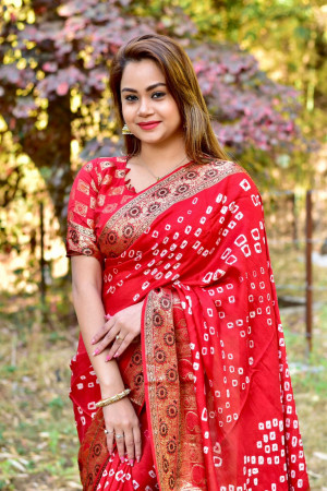 Red color hand bandhej bandhani saree with zari weaving work