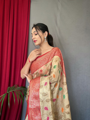 Off white color tissue silk saree with zari weaving work