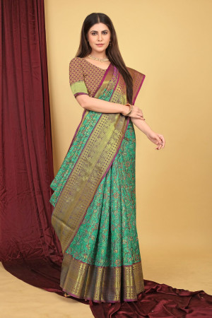 Green color kanchipuram silk saree with kalamkari weaving work