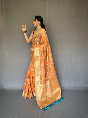 Orange color linen silk saree with woven design