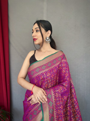 Purple color patola silk saree with woven design