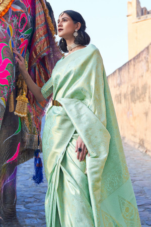Sea green color soft silk saree with zari weaving work