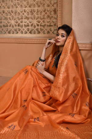 Orange color handloom raw silk saree with woven design