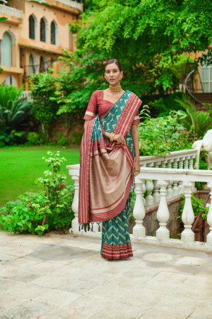 Rama green color soft raw silk saree with woven design