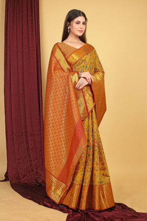 Mustard yellow color kanchipuram silk saree with kalamkari weaving work