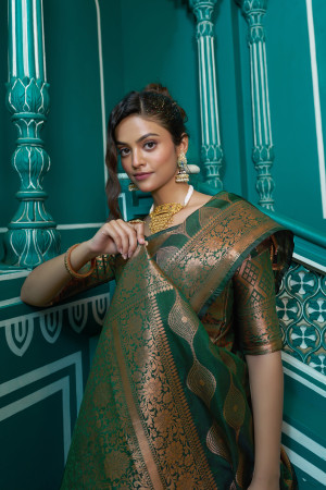 Green color katan silk saree with zari weaving work