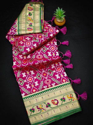 Magenta color patola silk saree with zari weaving work