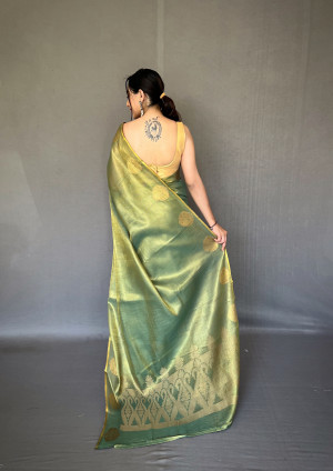 Green color tissue silk saree with zari weaving work