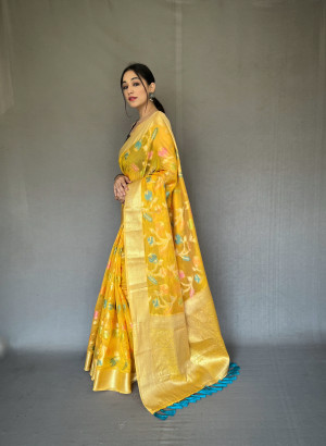 Yellow color linen silk saree with woven design