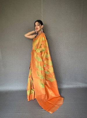 Peach color tissue silk saree with zari weaving work